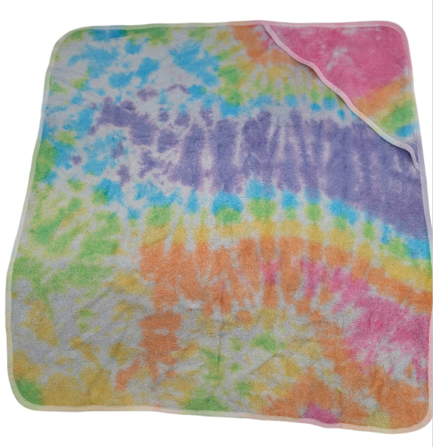 Colorful tie-dye towel on a white background